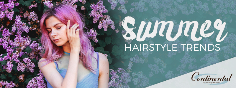 A woman with lavender hair in a garden. Summer hairstyle trends.
